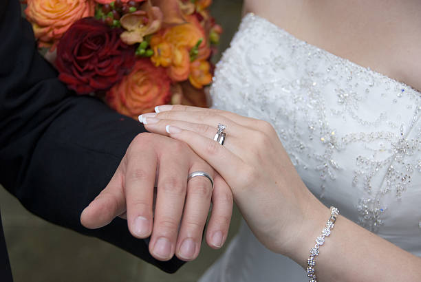 istock Bride, Groom, Bouquet and Rings 104874238