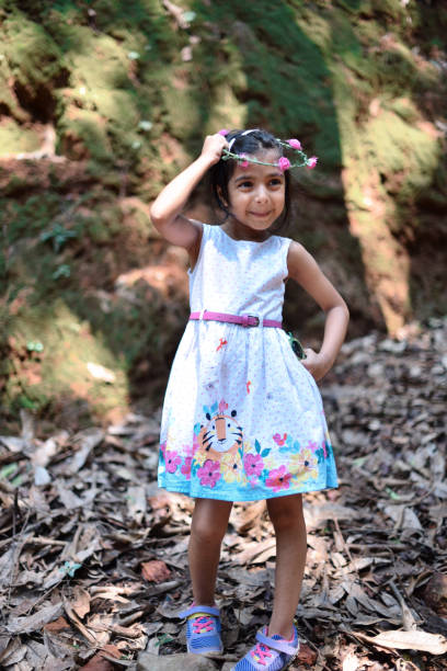 istock Cute Young girl (4-5 years) exploring in the nature 1048745656