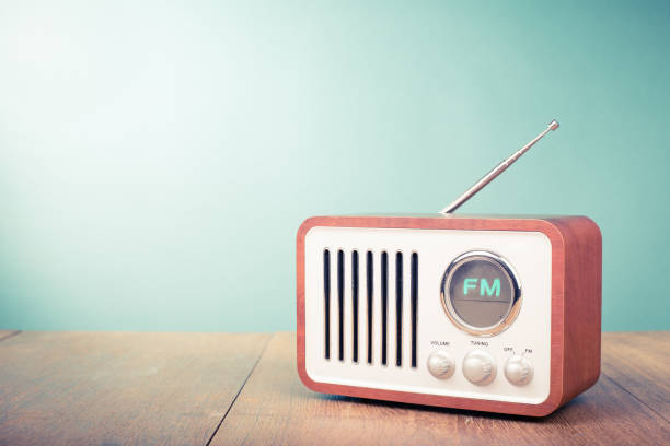 Retro old radio front mint green background. Vintage style filtered photo stock photo
