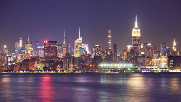 istock New York City waterfront panorama at night, USA. 1048756150