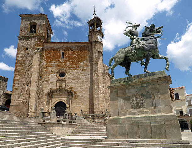 Plaza Mayor, Trujillo The statue of Francisco Pizarro and the Church of St. Martin in the Plaza Mayor at Trujillo, Spain. francisco pizarro stock pictures, royalty-free photos & images