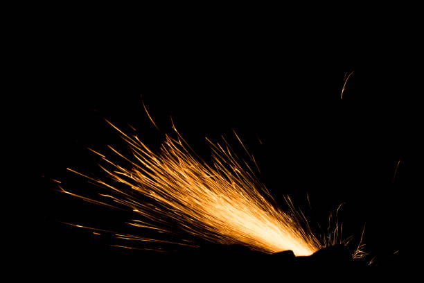 splash of shiny orange splashes on a black background.