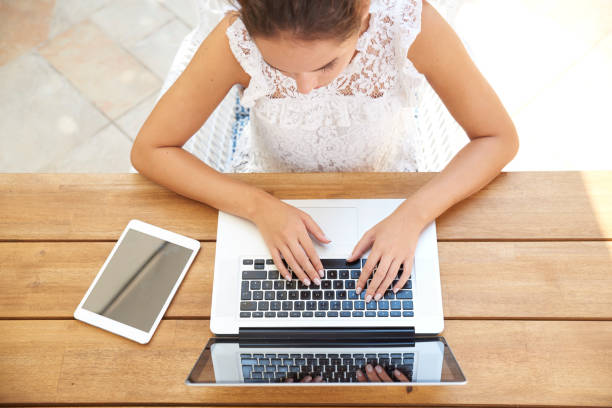 istock Woman typing on laptop 1048761200