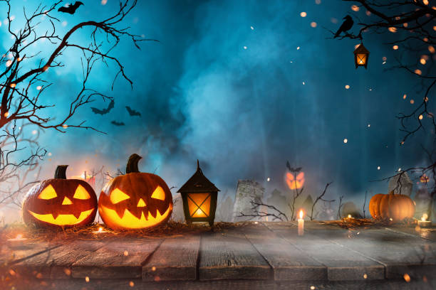 istock Halloween pumpkins on old wooden planks. 1048764548