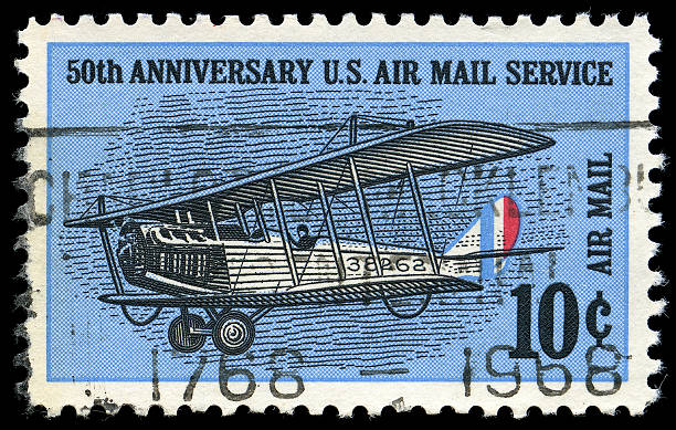istock 50th Anniversary US Air Mail Service - 10 Cent Stamp 104877228