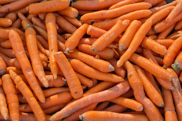istock organic carrots in public market 1048774642