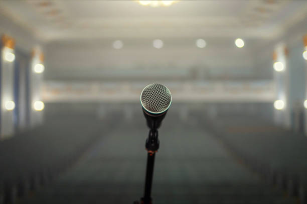 istock A microphone on stage in a concert hall or american bar (restaurant) during a show. 1048774898