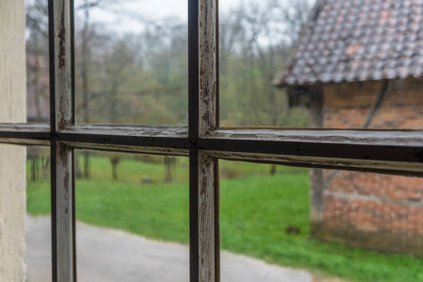 istock The window of an old farmhouse, inside 1048778702