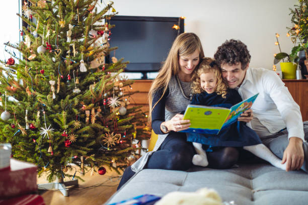 istock Father is reading a Christmas fairy tale 1048779062