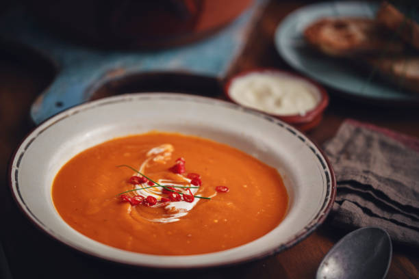 istock Pumpkin Soup with Chili and Sour Cream 1048785086