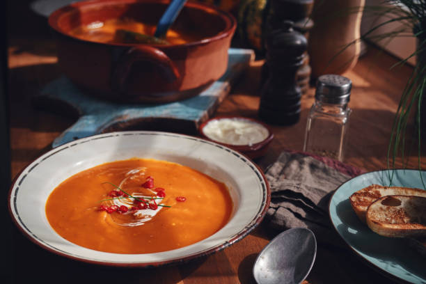 istock Pumpkin Soup with Chili and Sour Cream 1048785106