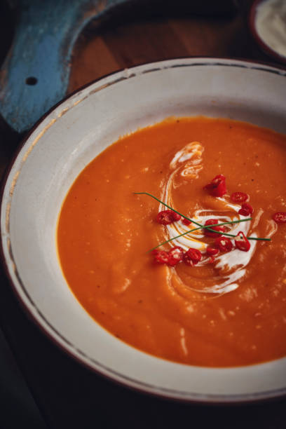istock Pumpkin Soup with Chili and Sour Cream 1048785108