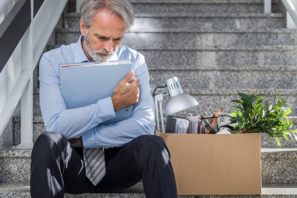 fired businessman - firing unemployment downsizing box imagens e fotografias de stock