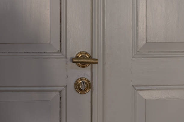 istock The old vintage door handle  against a wall 1048789844