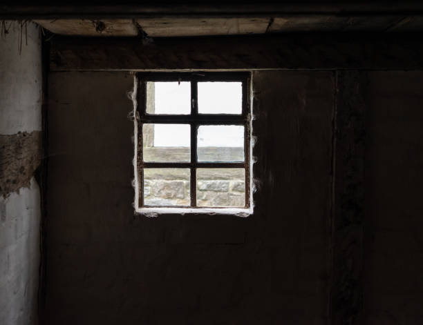 istock The window of an old farmhouse, inside 1048790022