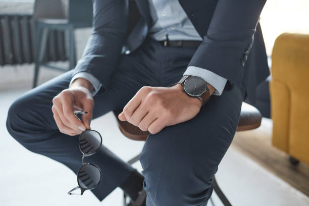 istock Stylish man with sunglasses and wristwatch 1048790464
