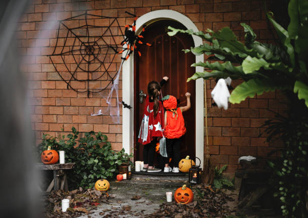 istock Little kids at a Halloween party 1048799518