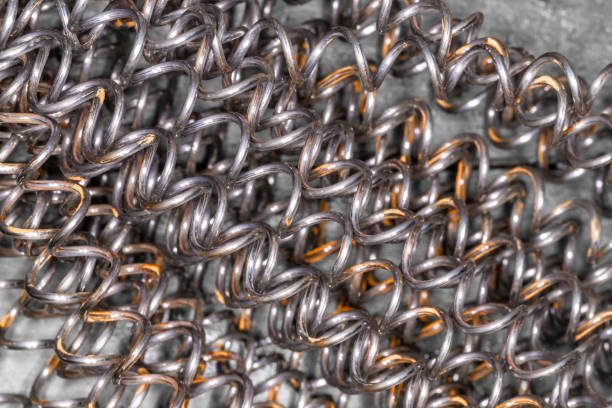 istock Steel spring. Iron wire with traces of rust. 1048800106