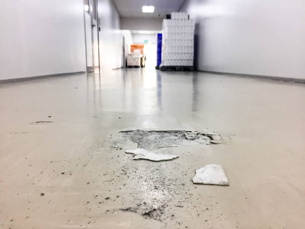 istock cracked floor in factory,dilapidated building,broken corridor 1048802880