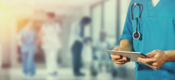 Concept of global medicine and healthcare. Doctor holds digital tablet. Diagnostics and modern technology in hospital Concept of global medicine and healthcare. Doctor holds digital tablet. Diagnostics and modern technology tablet pc and digital hospital tools stock pictures, royalty-free photos & images