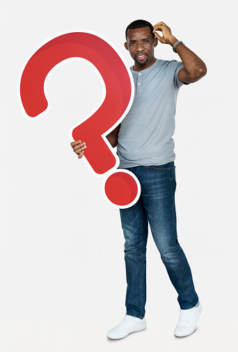 Confused man holding a question mark icon