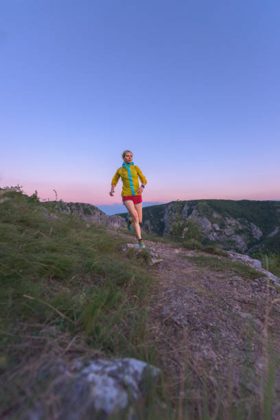 istock Woman athlete running outdoor 1048804032
