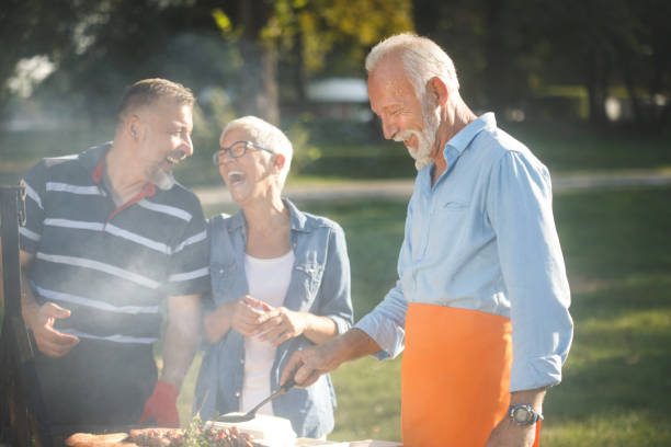 istock Senior people having a picnic 1048806910