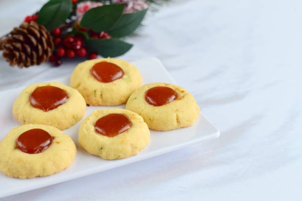 istock Homemade thumbprint cookies with strawberry jam 1048810636