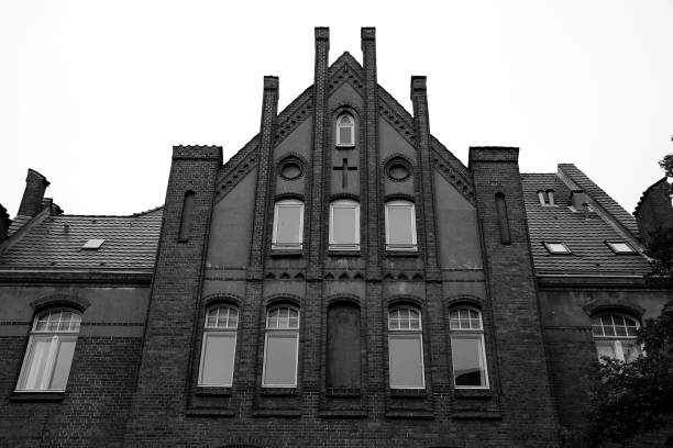 istock beautiful black and white church house 1048817854