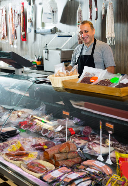istock butcher with smoked meat 1048817878