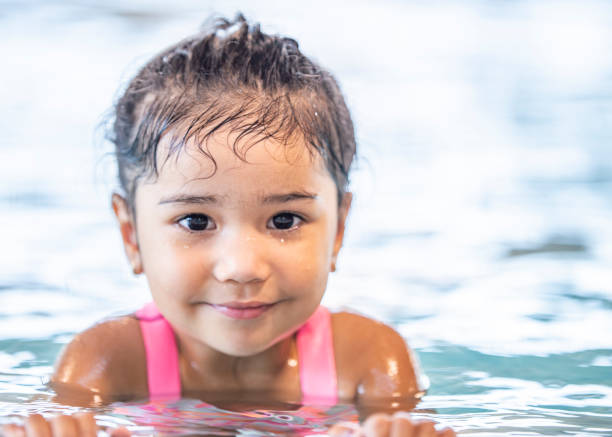 istock Girl In A Pool 1048821234