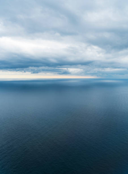 istock Dramatic sky and ocean seen from airplane 1048824374
