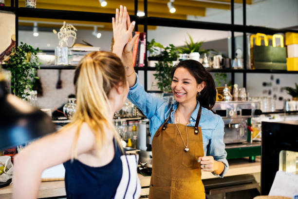 istock Women give a high five to each other 1048824680