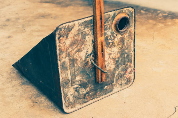 istock metal dustpan with wooden handle 1048825048