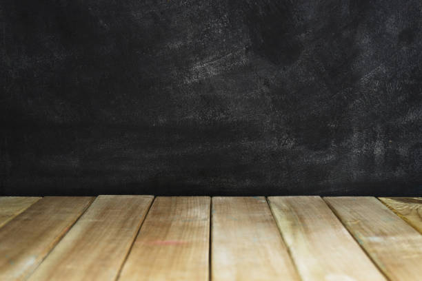istock Wood table and pink wall background 1048828228