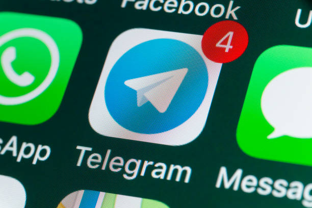 Telegram, Whatsapp, Messages and other phone Apps on iPhone screen stock photo