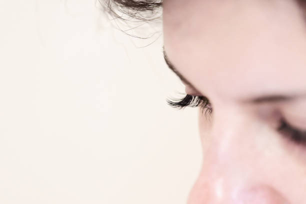 istock Closed woman eyes with long eyelashes 1048828636