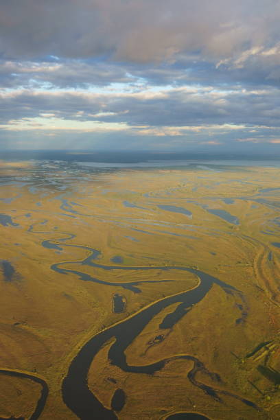 istock Amur River tributaries. View from window of plane 1048828756