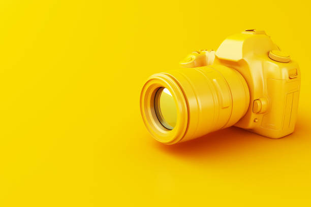 istock 3D Digital yellow photo camera. 1048834760