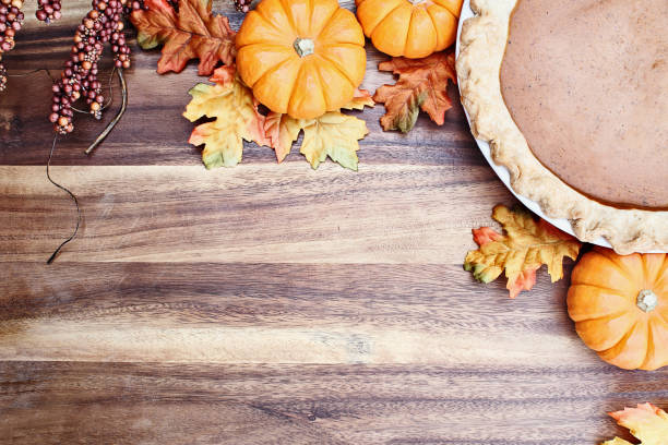 istock Pumpkin Pie and Autumn Leaves 1048834960