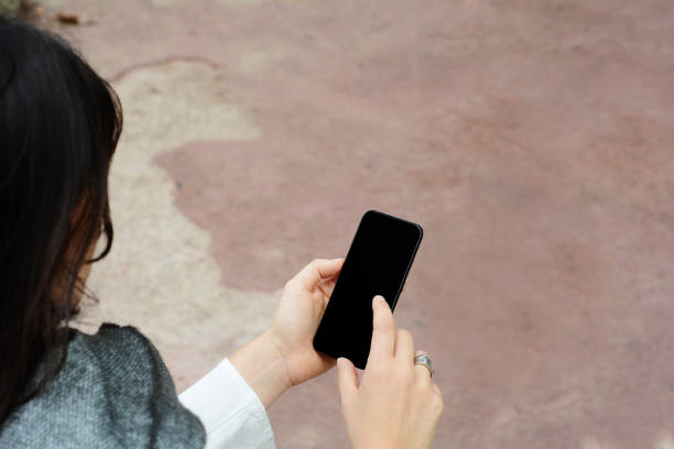 istock Young latin women sending message with smartphone. 1048835884