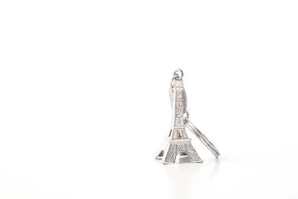 istock Key chain in the shape of Eiffel Tower white background 1048838056
