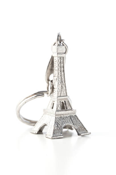 istock Key chain in the shape of Eiffel Tower white background 1048838082