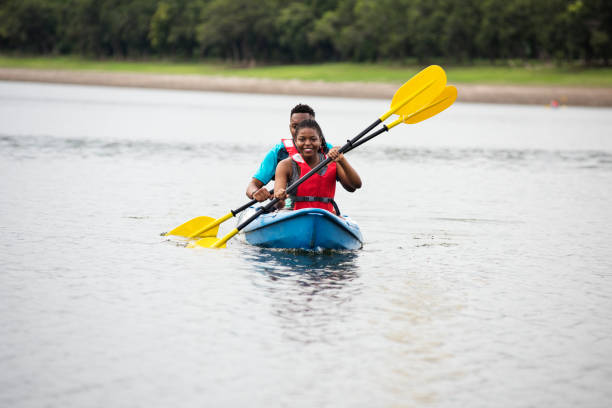 istock Couple canoeing in a lake 1048841998