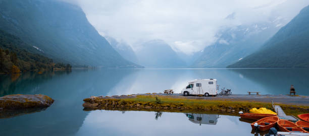 Family vacation travel RV, holiday trip in motorhome Family vacation travel RV, holiday trip in motorhome, Caravan car Vacation. Beautiful Nature Norway natural landscape. northern europe family car stock pictures, royalty-free photos & images