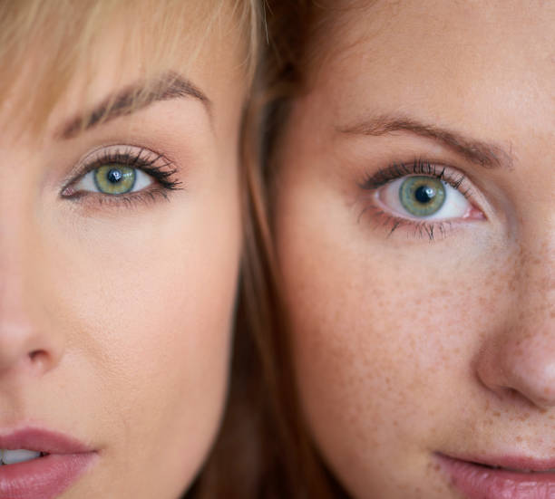 istock Close up of two different woman's face 1048842956