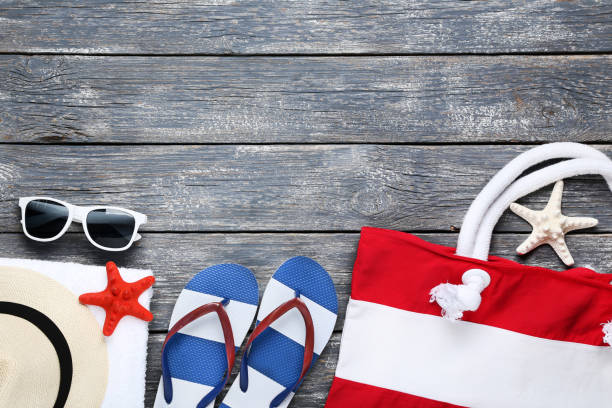 istock Beach accessories with starfishes on wooden table 1048843206