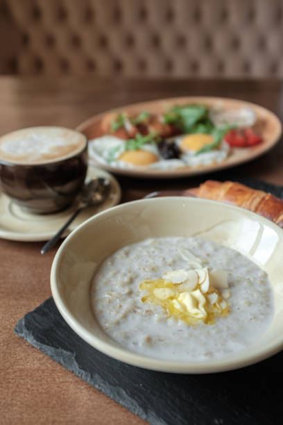 istock Healthy breakfast with oatmeal and raspberries 1048843368