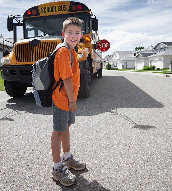 istock Young boy waiting to cross street 104884390