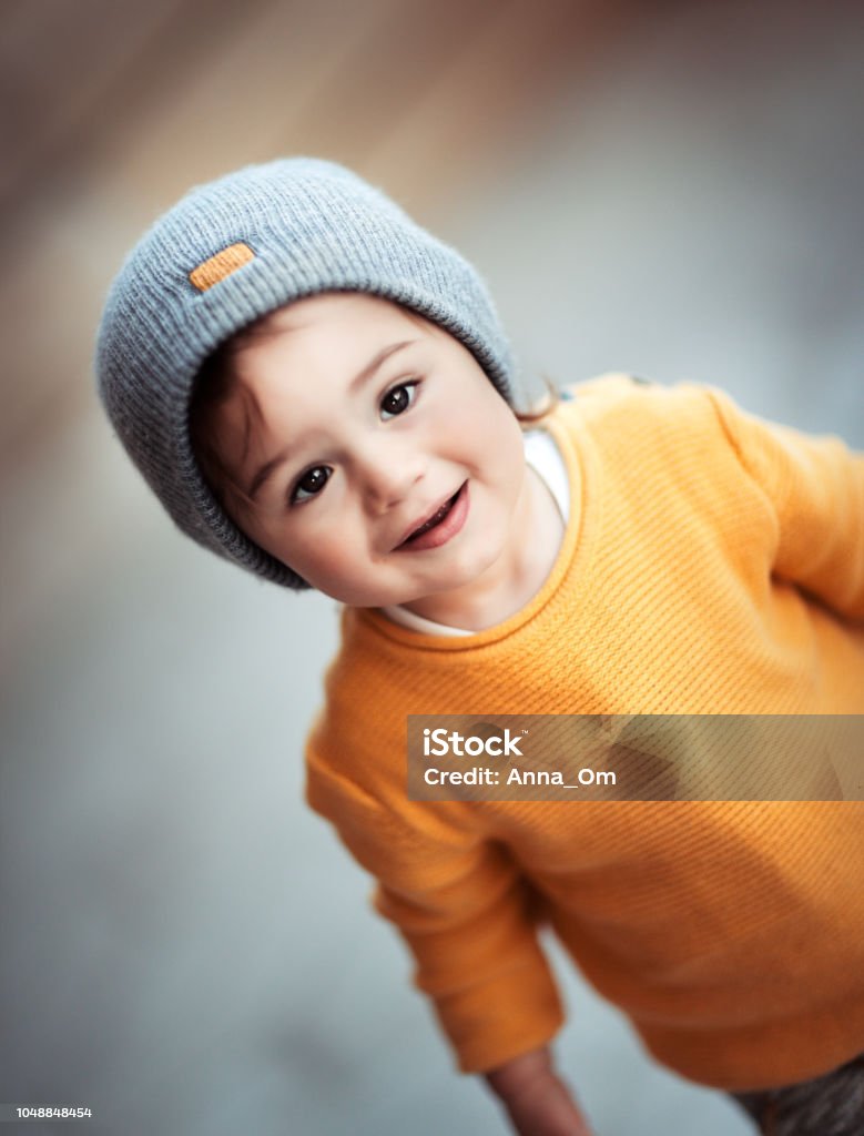 Cute Baby Boy Wearing Stylish Warm Clothes Stock Photo - Download ...